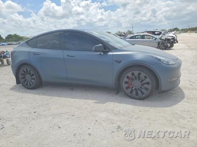 Czwarte zdjęcie samochodu z boku: 2022 TESLA MODEL Y VIN:7SAYGDEF8NF358297 - miniatura
