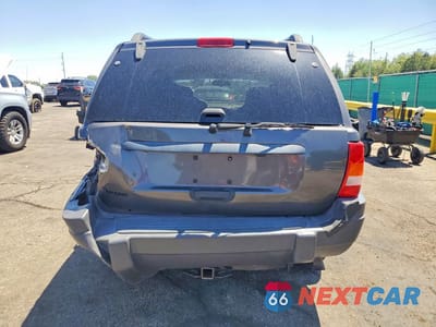 Zdjęcie 6 z 13 samochodu: 2004 JEEP GRAND CHEROKEE LAREDO VIN:1J4GW48S04C331184 - miniatura