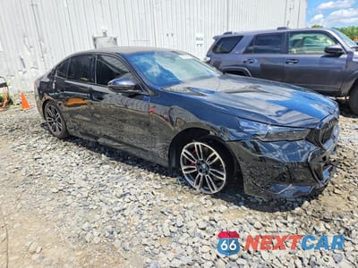Czwarte zdjęcie samochodu z boku: 2024 BMW 530 XI VIN:WBA53FJ09RCT07531 - miniatura