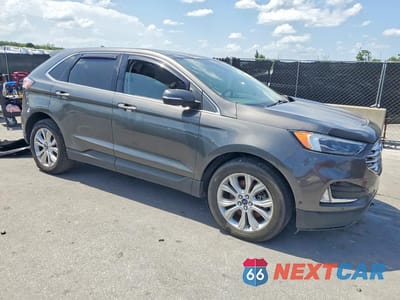 Czwarte zdjęcie samochodu z boku: 2020 FORD EDGE TITANIUM VIN:2FMPK4K96LBA60150 - miniatura