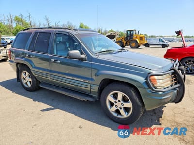 Czwarte zdjęcie samochodu z boku: 2004 JEEP GRAND CHEROKEE LIMITED VIN:1J4GW58NX4C179379 - miniatura