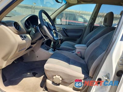 Zdjęcie 7 z 13 samochodu: 2002 TOYOTA RAV4 BASE VIN:JTEGH20V726006162 - miniatura