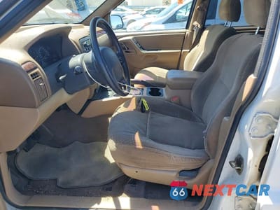 Zdjęcie 7 z 13 samochodu: 2000 JEEP GRAND CHEROKEE LAREDO VIN:1J4GW48S6YC114132 - miniatura