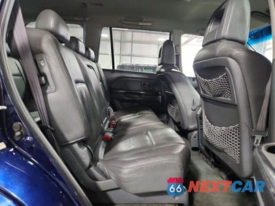 Zdjęcie 11 z 14 samochodu: 2004 HONDA PILOT EXL VIN:2HKYF18624H567464 - miniatura