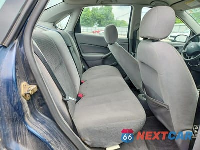Zdjęcie 10 z 12 samochodu: 2003 FORD FOCUS LX VIN:1FAFP33PX3W267816 - miniatura