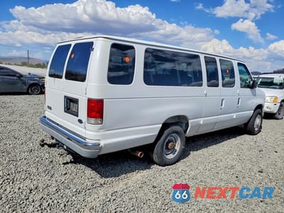 Trzecie zdjęcie samochodu z tyłu: 2000 FORD ECONOLINE E350 SUPER DUTY WAGON VIN:1FBSS31S4YHA71224 - miniatura