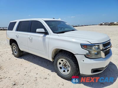 Czwarte zdjęcie samochodu z boku: 2019 CHEVROLET TAHOE SPECIAL VIN:1GNSKFEC5KR122948 - miniatura