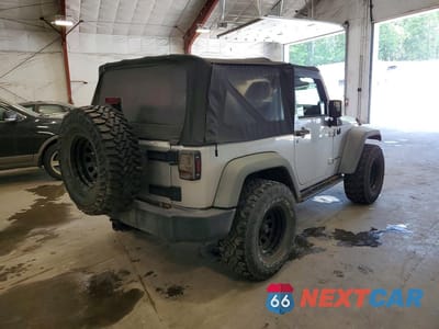 Trzecie zdjęcie samochodu z tyłu: 2011 JEEP WRANGLER SPORT VIN:1J4AA2D10BL511266 - miniatura