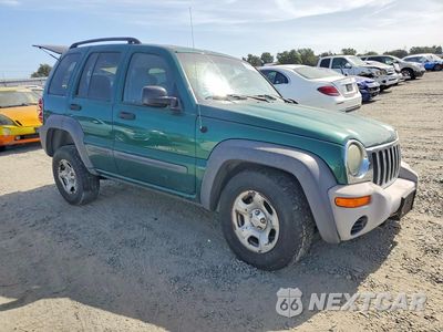 Czwarte zdjęcie samochodu z boku: 2003 JEEP LIBERTY SPORT VIN:1J8GL48K13W720338 - miniatura