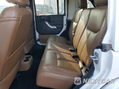 Zdjęcie 10 z 13 samochodu: 2014 JEEP WRANGLER UNLIMITED SAHARA VIN:1C4BJWEG8EL107172 - miniatura
