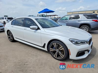 Czwarte zdjęcie samochodu z boku: 2019 BMW 750 I VIN:WBA7F0C56KGM25864 - miniatura
