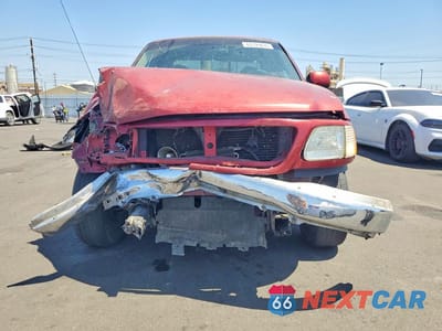 Piąte zdjęcie samochodu w środku: 2000 FORD F150 VIN:1FTRX17W6YNB58053 - miniatura