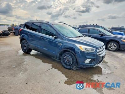 Czwarte zdjęcie samochodu z boku: 2019 FORD ESCAPE TITANIUM VIN:1FMCU0J94KUA62927 - miniatura