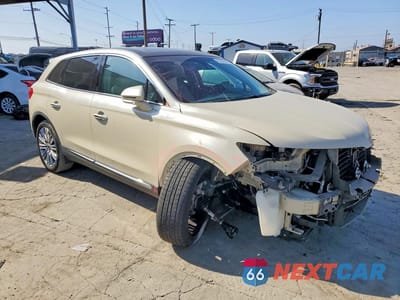 Czwarte zdjęcie samochodu z boku: 2018 LINCOLN MKX RESERVE VIN:2LMPJ6LR3JBL40817 - miniatura