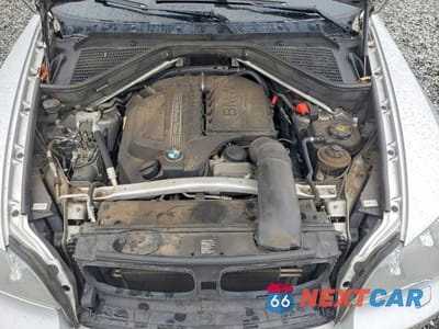 Zdjęcie 12 z 13 samochodu: 2013 BMW X5 XDRIVE35I VIN:5UXZV4C5XD0B06938 - miniatura