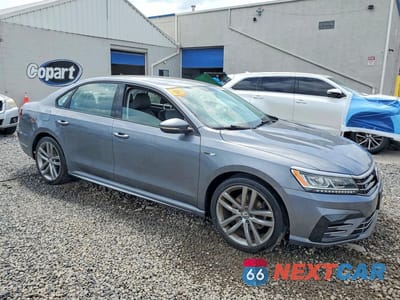 Czwarte zdjęcie samochodu z boku: 2018 VOLKSWAGEN PASSAT S VIN:1VWAA7A38JC009917 - miniatura