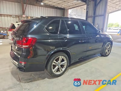 Trzecie zdjęcie samochodu z tyłu: 2014 BMW X5 XDRIVE50I VIN:5UXKR6C50E0J71698 - miniatura