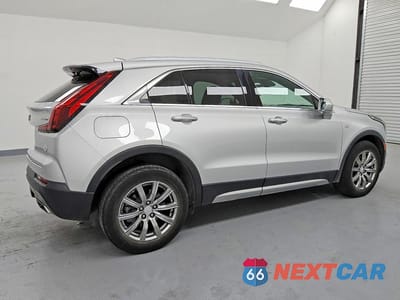 Trzecie zdjęcie samochodu z tyłu: 2020 CADILLAC XT4 PREMIUM LUXURY VIN:1GYFZDR41LF123623 - miniatura