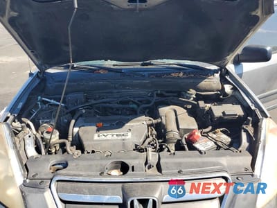 Zdjęcie 12 z 13 samochodu: 2005 HONDA CR-V LX VIN:JHLRD68515C019101 - miniatura