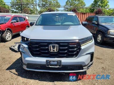 Piąte zdjęcie samochodu w środku: 2023 HONDA PILOT TRAILSPORT VIN:5FNYG1H66PB000285 - miniatura