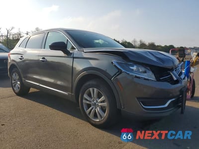 Czwarte zdjęcie samochodu z boku: 2018 LINCOLN MKX PREMIERE VIN:2LMPJ8JR5JBL13116 - miniatura