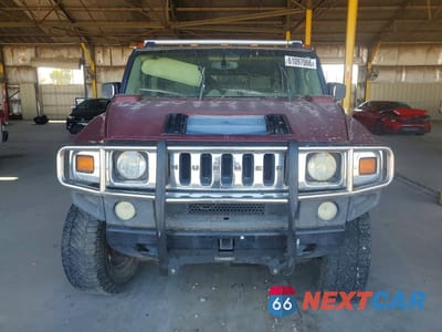 Piąte zdjęcie samochodu w środku: 2003 HUMMER H2 VIN:5GRGN23U83H144409 - miniatura