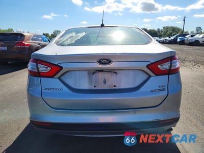 Zdjęcie 6 z 12 samochodu: 2015 FORD FUSION SE HYBRID VIN:3FA6P0LU4FR226996 - miniatura
