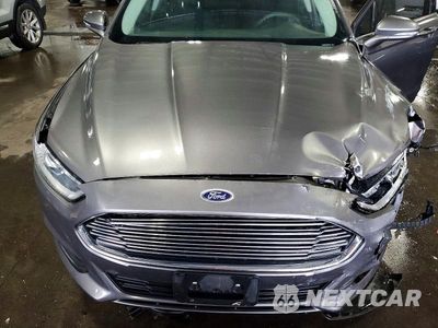 Zdjęcie 11 z 13 samochodu: 2014 FORD FUSION SE VIN:1FA6P0HDXE5397469 - miniatura