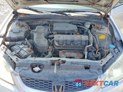 Zdjęcie 11 z 12 samochodu: 2005 HONDA CIVIC DX VP VIN:1HGEM22115L080315 - miniatura