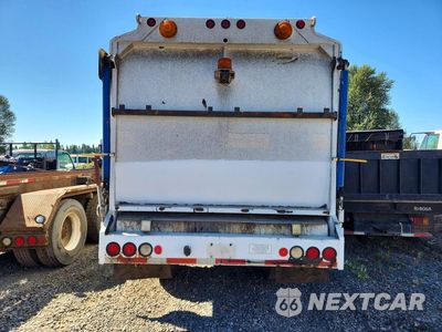 Zdjęcie 6 z 13 samochodu: 2003 FREIGHTLINER FL70 PACKER GARBAGE TRUCK VIN:1FVABTBV43HK82615 - miniatura