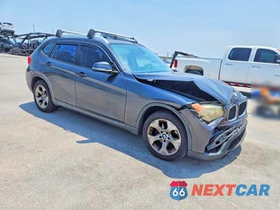 Czwarte zdjęcie samochodu z boku: 2013 BMW X1 SDRIVE28I VIN:WBAVM1C52DVW44810 - miniatura