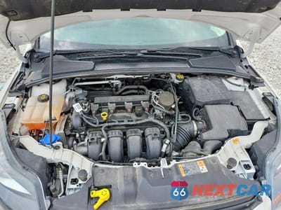 Zdjęcie 11 z 12 samochodu: 2014 FORD FOCUS TITANIUM VIN:1FADP3N27EL439510 - miniatura