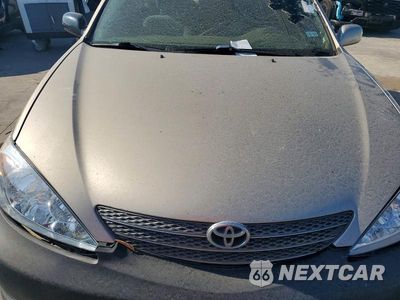 Zdjęcie 11 z 11 samochodu: 2002 TOYOTA CAMRY LE VIN:JTDBE32K120019704 - miniatura