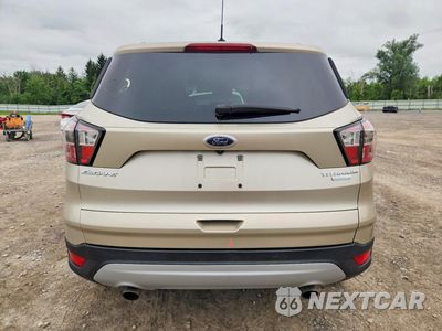 Zdjęcie 6 z 14 samochodu: 2017 FORD ESCAPE TITANIUM VIN:1FMCU0J90HUB86055 - miniatura