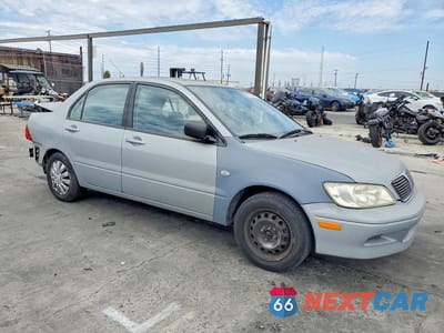 Czwarte zdjęcie samochodu z boku: 2003 MITSUBISHI LANCER ES VIN:JA3AJ26E53U024256 - miniatura