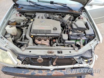 Zdjęcie 11 z 12 samochodu: 2002 TOYOTA AVALON XLS VIN:4T1BF28B12U255496 - miniatura