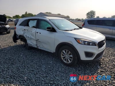 Czwarte zdjęcie samochodu z boku: 2016 KIA SORENTO LX VIN:5XYPG4A30GG118628 - miniatura