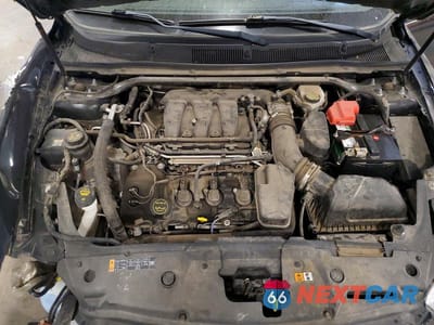 Zdjęcie 11 z 12 samochodu: 2014 FORD TAURUS SEL VIN:1FAHP2E80EG153233 - miniatura