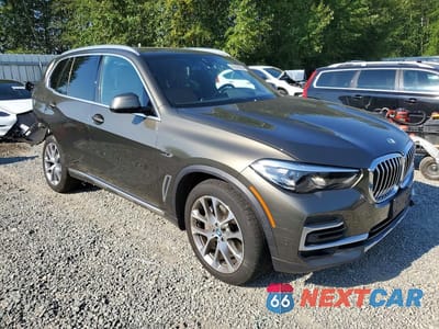 Czwarte zdjęcie samochodu z boku: 2022 BMW X5 XDRIVE45E VIN:5UXTA6C02N9L41295 - miniatura