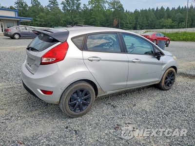 Trzecie zdjęcie samochodu z tyłu: 2012 FORD FIESTA SE VIN:3FADP4EJ4CM184582 - miniatura