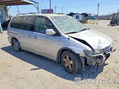 Czwarte zdjęcie samochodu z boku: 2004 HONDA ODYSSEY EXL VIN:2HKRL18072H541271 - miniatura