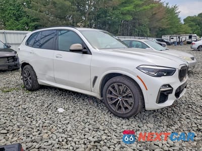 Czwarte zdjęcie samochodu z boku: 2021 BMW X5 M50I VIN:5UXJU4C07M9F80670 - miniatura