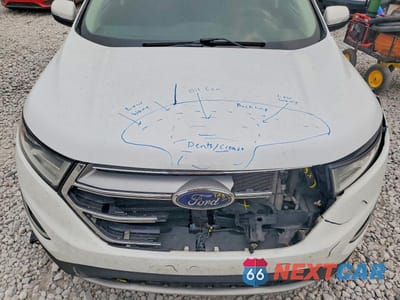 Zdjęcie 12 z 13 samochodu: 2015 FORD EDGE SEL VIN:2FMTK4J98FBB00779 - miniatura