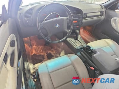 Zdjęcie 8 z 12 samochodu: 1998 BMW 323 IC AUTOMATIC VIN:WBABJ8322WEM21728 - miniatura