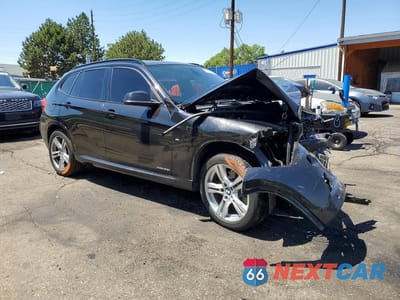 Czwarte zdjęcie samochodu z boku: 2014 BMW X1 XDRIVE28I VIN:WBAVL1C54EVY19868 - miniatura