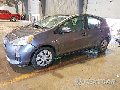 2014 TOYOTA PRIUS C THREE JTDKDTB36E1560600 - główne zdjęcie licytacji z USA - miniatura