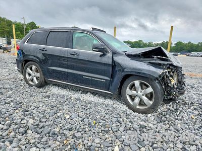 Czwarte zdjęcie samochodu z boku: 2016 JEEP GRAND CHEROKEE SUMMIT VIN:1C4RJFJT7GC489540 - miniatura