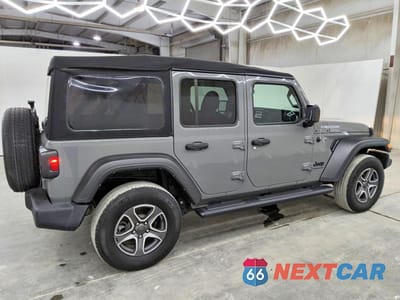 Trzecie zdjęcie samochodu z tyłu: 2023 JEEP WRANGLER SPORT VIN:1C4HJXDG5PW509413 - miniatura