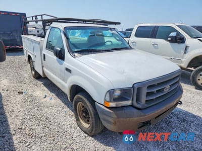 Czwarte zdjęcie samochodu z boku: 2003 FORD F250 SUPER DUTY VIN:1FDNF20L43EC90823 - miniatura