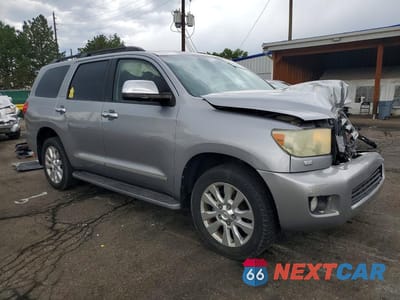 Czwarte zdjęcie samochodu z boku: 2010 TOYOTA SEQUOIA PLATINUM VIN:5TDDW5G16AS032249 - miniatura